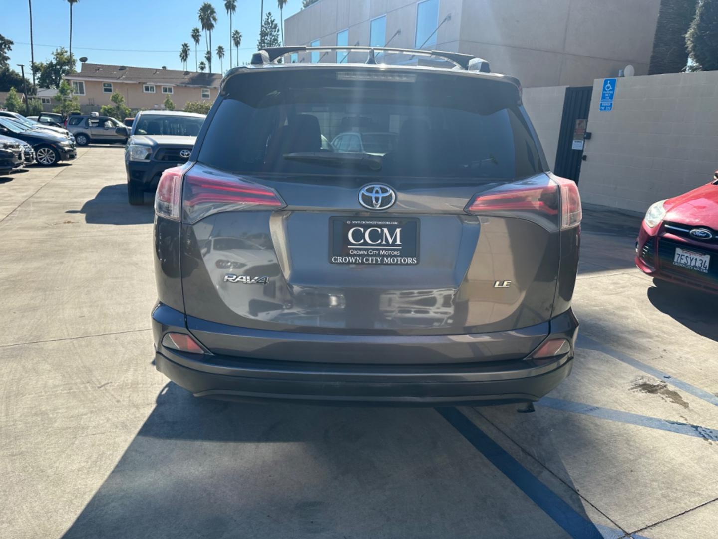 2016 Gray /Black Toyota RAV4 (JTMZFREVXGJ) , AUTOMATIC transmission, located at 30 S. Berkeley Avenue, Pasadena, CA, 91107, (626) 248-7567, 34.145447, -118.109398 - Photo#3